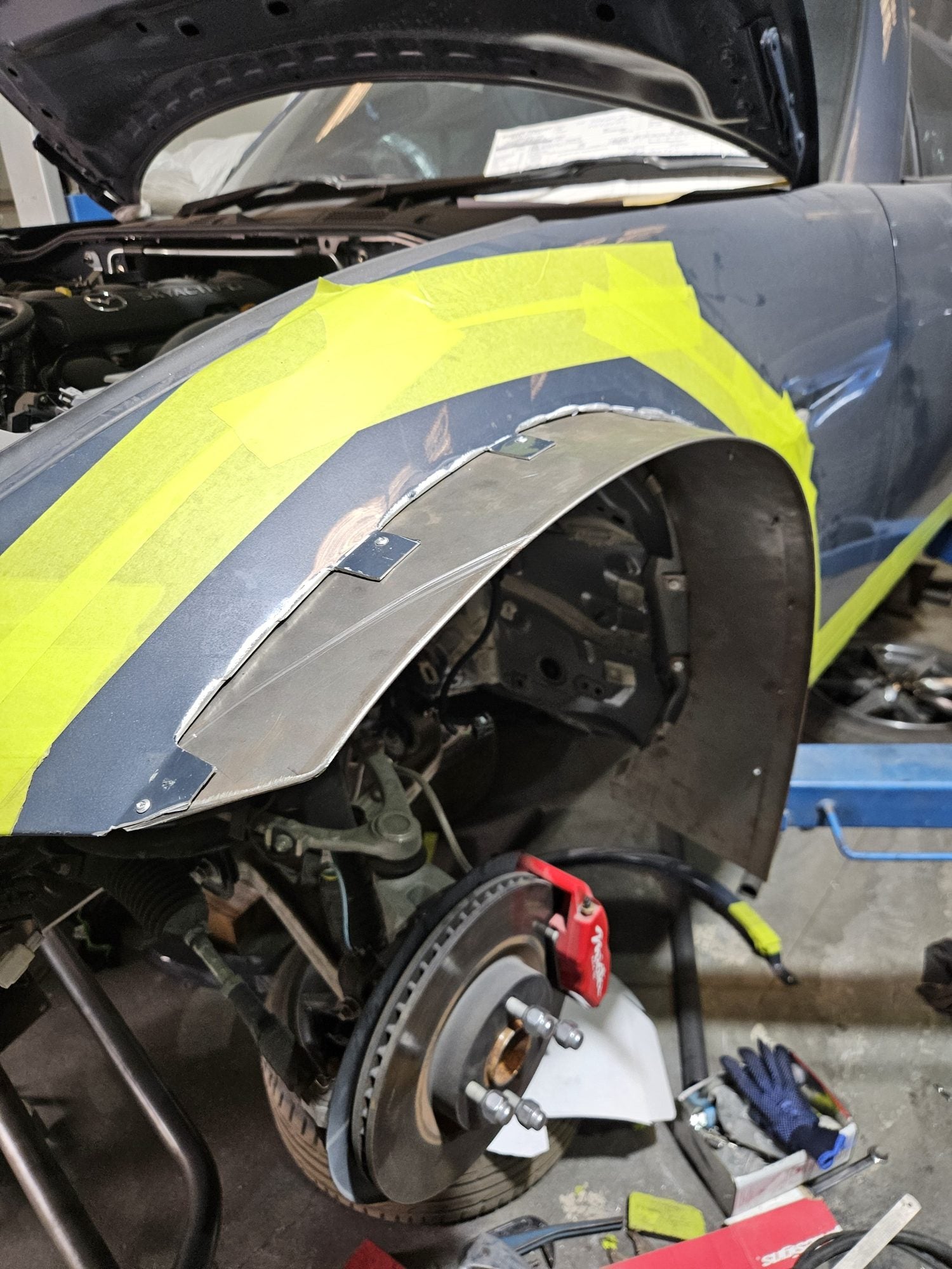 Raw metal Simba fender fabrication